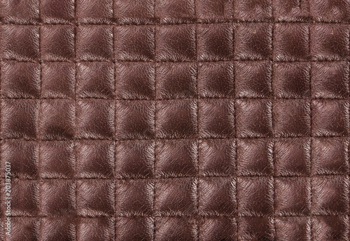 brown leather texture colose-up with linear stiches