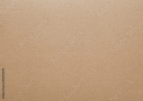 Brown cardboard sheet abstract texture or background.