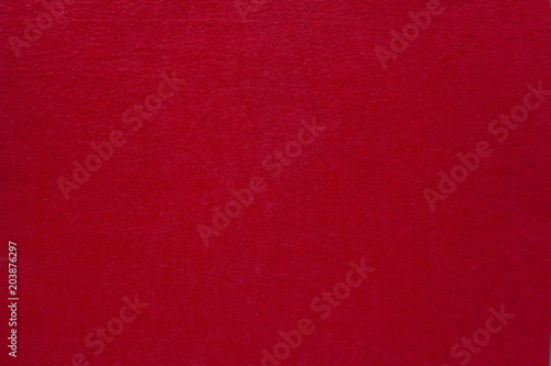 Texture of red fabric as a background.