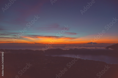 View of sunrise from the Mount Batur volcano, Bali, Indonesia.