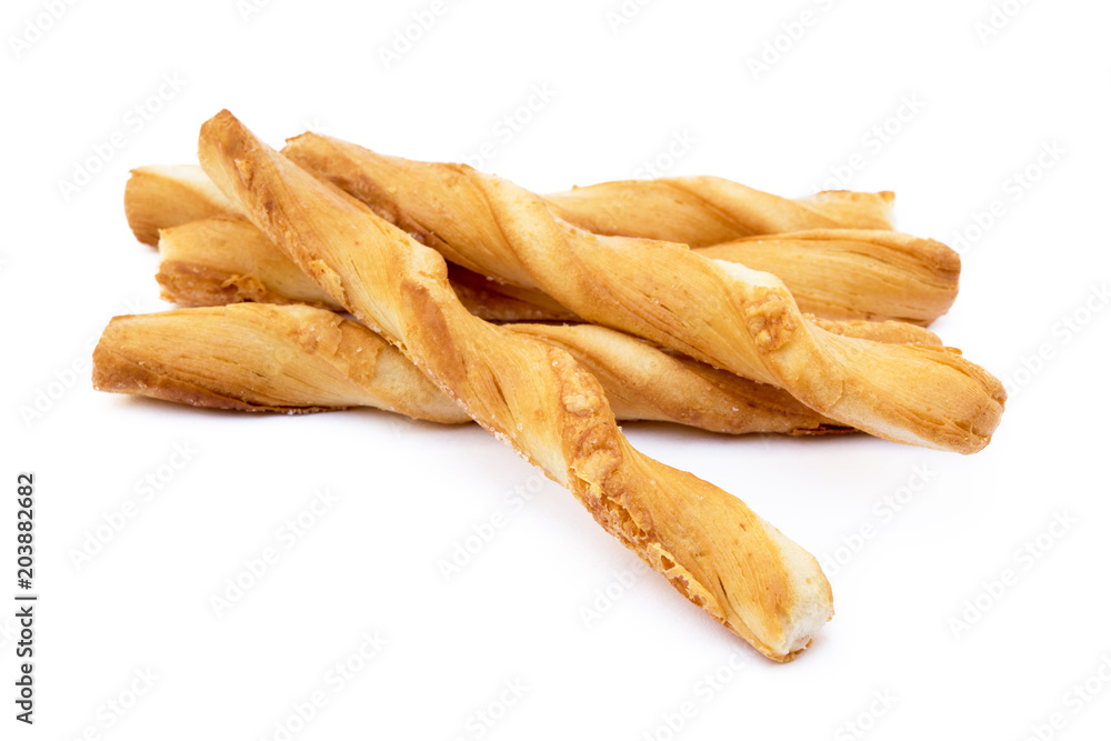 Spiral bread sticks with cheese on a white background Spiral bread sticks with cheese on a white background