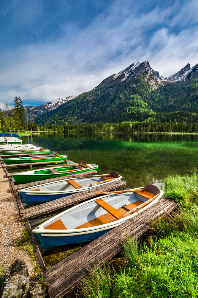 Small boats on the lake Hintersee in the Alps