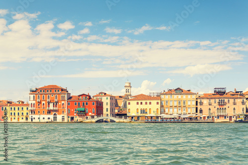 Picturesque summer view of Venice with famous water canals  and colorful historical buildings. © 18042011