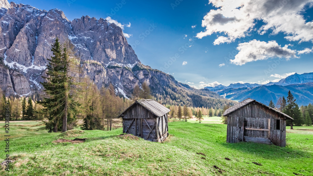 Beautiful small hut in the dolomites in spring, Italy, Europe