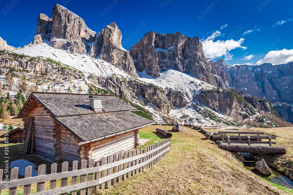 Small hut and beautiful dolomites in spring, Italy
