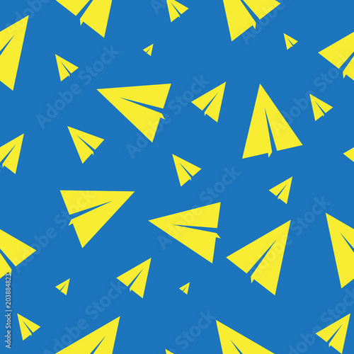Seamless background with folded aircraft. On the blue background are paper-folded planes of various sizes  flying in all directions.