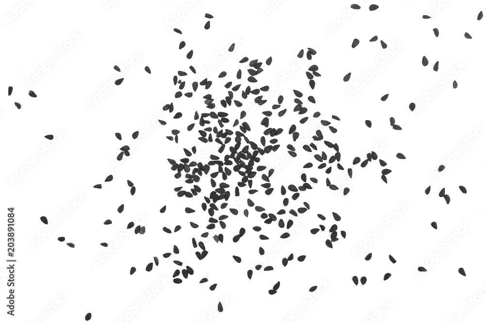 Pile of black cumin seeds isolated on white background, top view Pile of black cumin seeds isolated on white background, top view