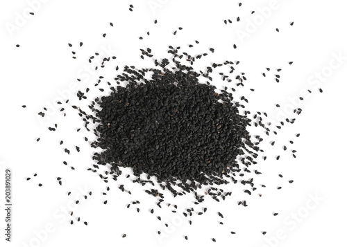 Pile of black cumin seeds isolated on white background, top view