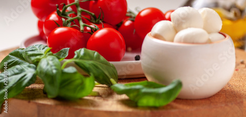 Tomatoes, basil, mozzarella cheese. Caprese salad ingredients