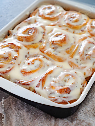 buns with cinnamon and cream photo