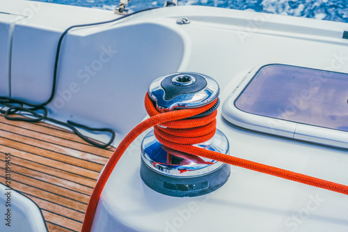 Sailing Boat Winch with Red Rope in 44 Feet Crusing Boat photo