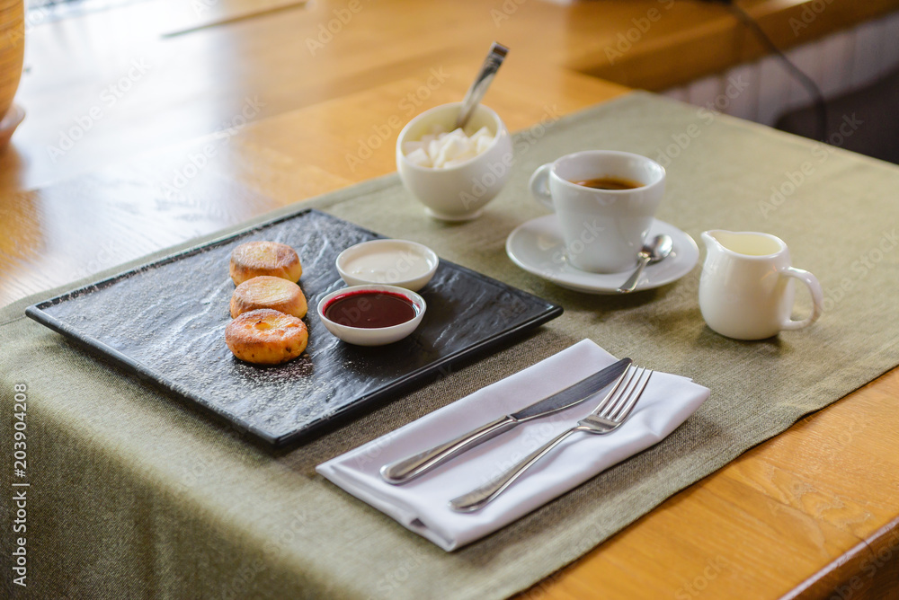 photo of traditional rustic sweet bun cakes with cream cheese inside and powder sugar on surface. photo of traditional rustic sweet bun cakes with cream cheese inside and powder sugar on surface.
