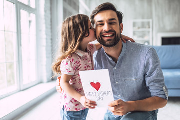 Dad with daughter at home