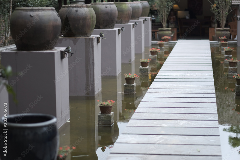 Stone path for passage to the pagoda standing on the water Stone path for passage to the pagoda standing on the water