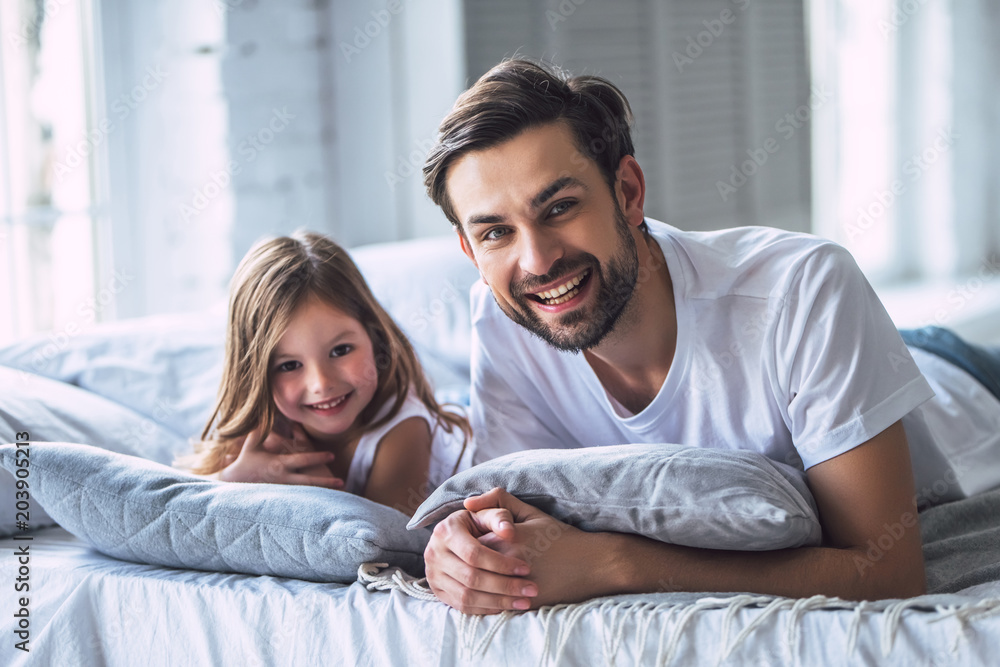 Fototapeta premium Dad with daughter at home