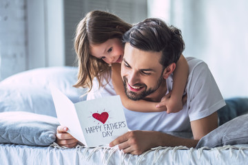 Dad with daughter at home