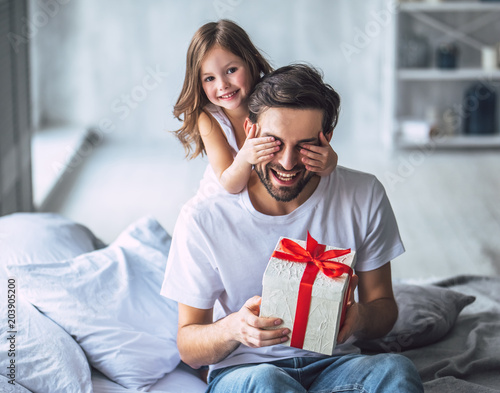 Dad with daughter at home