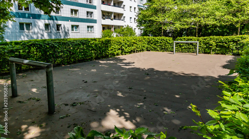 footballground for youngsters in frint of a residentail building photo