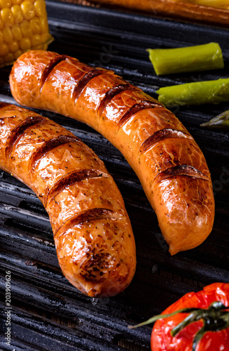 grilled krakauer with french fries and green salad