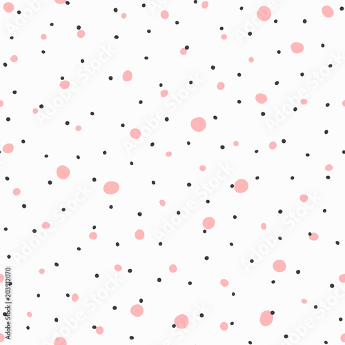 Seamless pattern with small rounded spots. Irregular colored polka dot. Endless girly print.