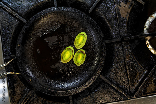 Roasted leek on frying pan photo