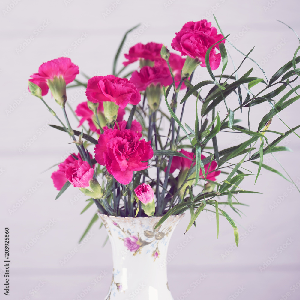 custom made wallpaper toronto digitalBouquet of pink carnations in a rustic vase on a white background