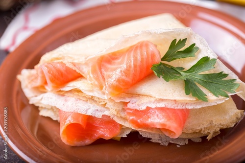 Pancakes with salmon. Tasty pancakes. Maslenitsa