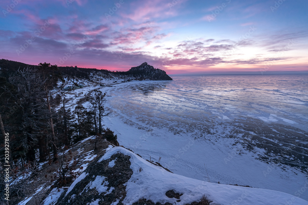 Winter sunrise in Sandy Bay on Lake Baikal