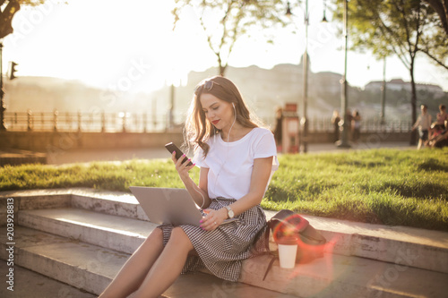 Free Download Amazing girl in the park with laptop - GFXLoad