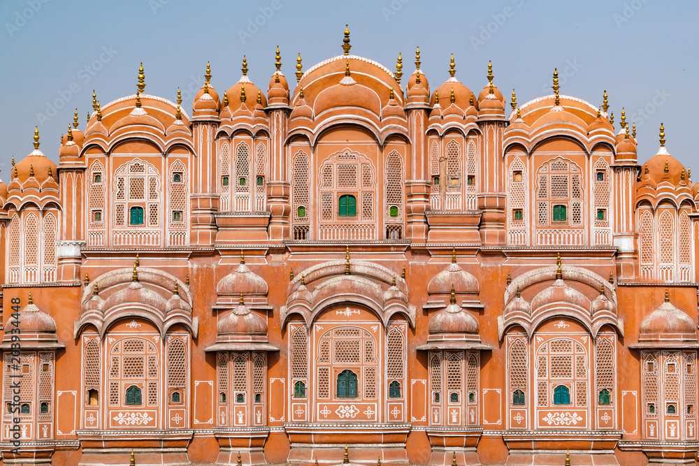 Hawa Mahal on a sunny day, Jaipur, Rajasthan, India. An UNESCO World heritage. Beautiful window architectural element.