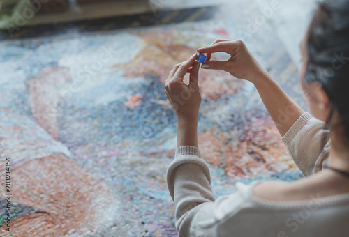 Young girl with a mosaic