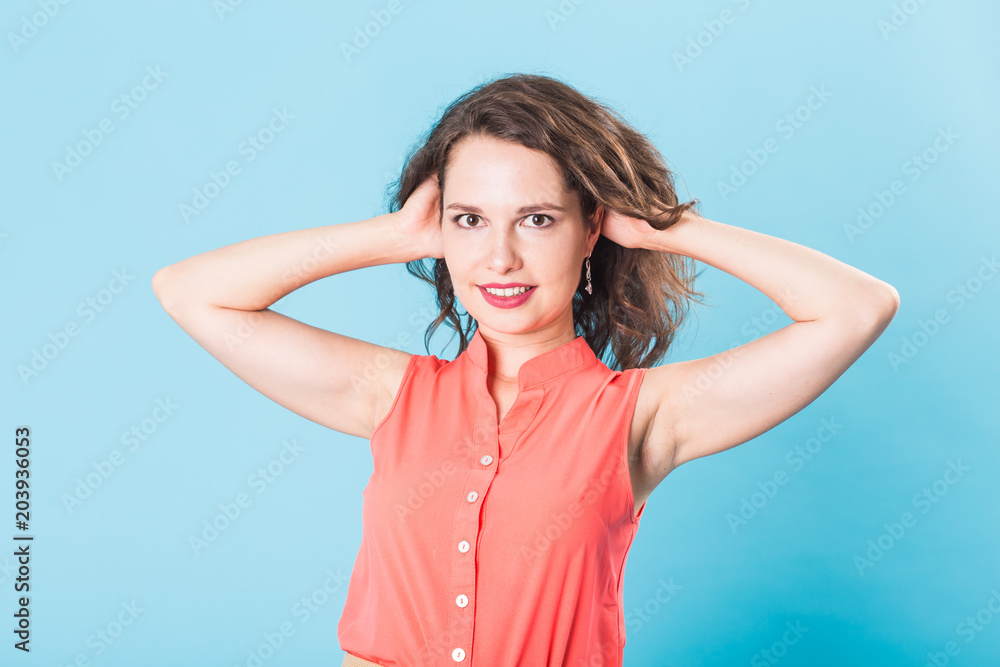 beautiful happy smiling teen girl over blue background beautiful happy smiling teen girl over blue background