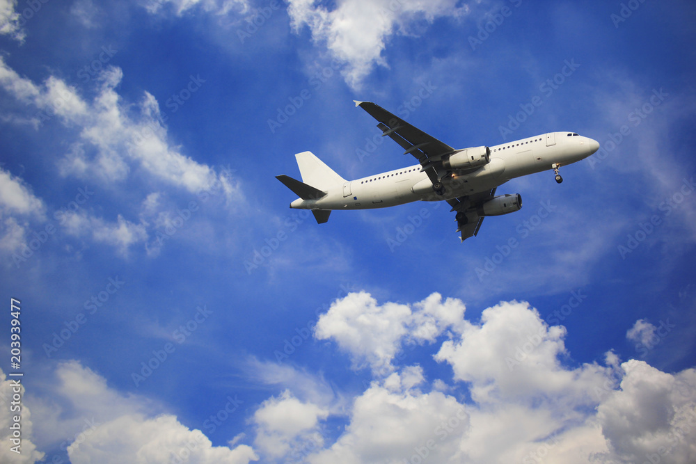 Fototapeta premium Airplane with beautiful sky on background
