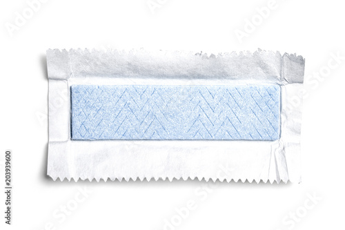 Fotografie Top view of unwrapped chewing gum on white background