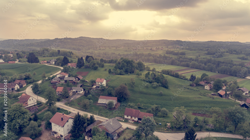 Fototapeta premium Aerial view of countryside at sunset.