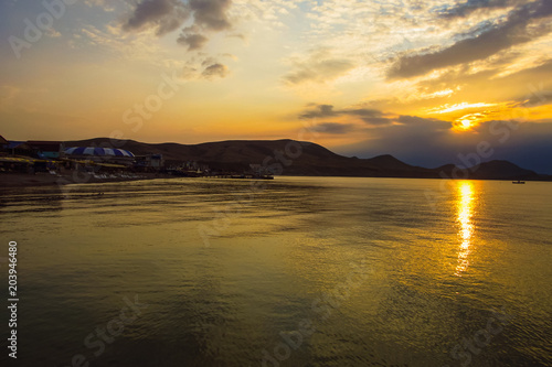 Sunset. Solar path on the sea water. Cape Hamelion. Crimea