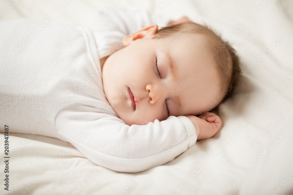 Cute sleeping baby on white background (up to one month) Cute sleeping baby on white background (up to one month)