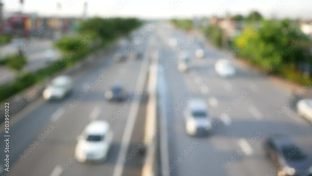 Top view of blurred car traffic on road in urban city Top view of blurred car traffic on road in urban city