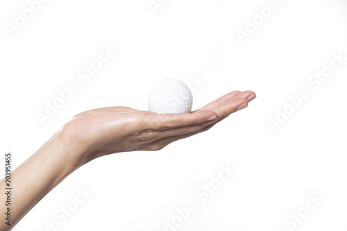 Golf ball in woman hand isolated on white background