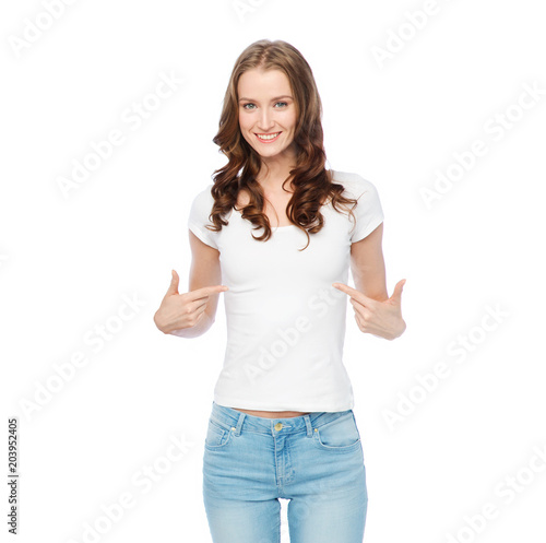 body positive and people concept - happy woman in white t-shirt pointing fingers to herself