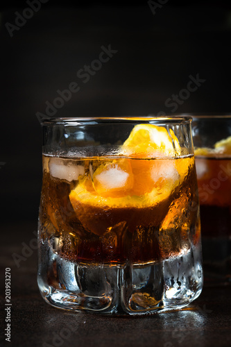 Negroni cocktail in glass on dark. 