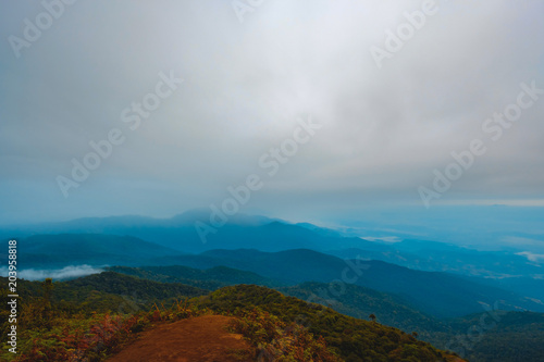 high mountains peaks range clouds in fog scenery landscape national park view outdoor at Chiang Rai, Chiang Mai Province, Thailand