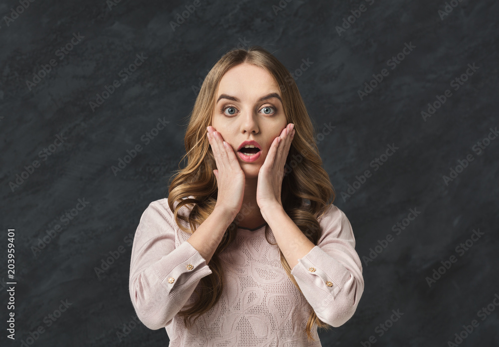 Shocked girl with opened mouth in full disbelief Shocked girl with opened mouth in full disbelief
