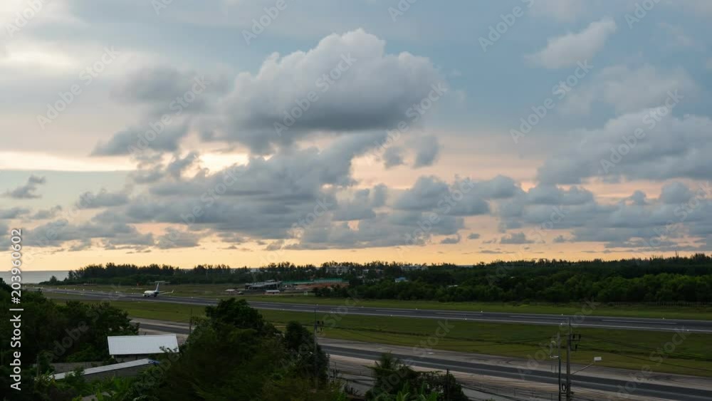 Time lapse of airport exterior and clouds moving fast in the sky Time lapse of airport exterior and clouds moving fast in the sky