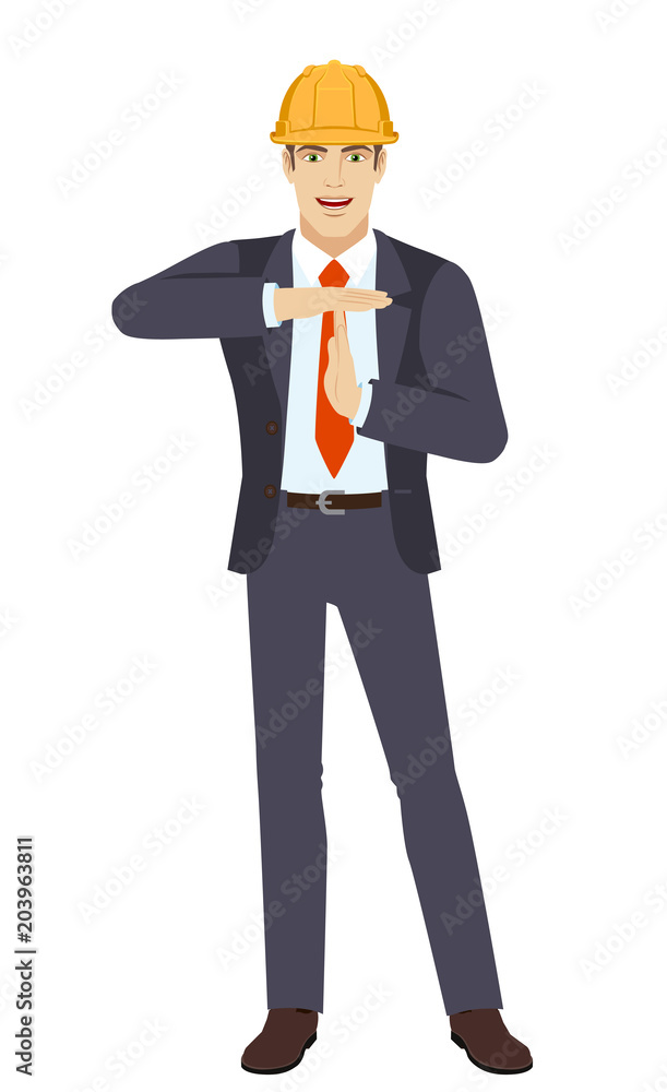 Businesswoman in construction helmet showing time-out sign with hands. Body language