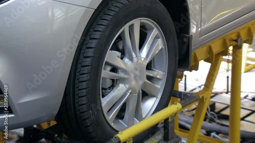 car suspension test at automobile factory, close-up