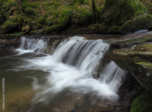 Fototapeta Naklejka Na Ścianę i Meble -  Kleiner Wasserfall im Naturpark Schwäbisch-Fränkischen Wald