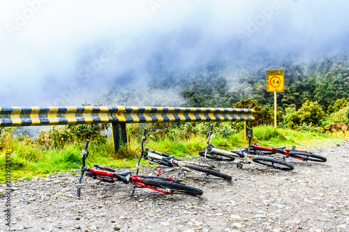 Mountainbikes on the death road in the Yungas of Bolivia photo