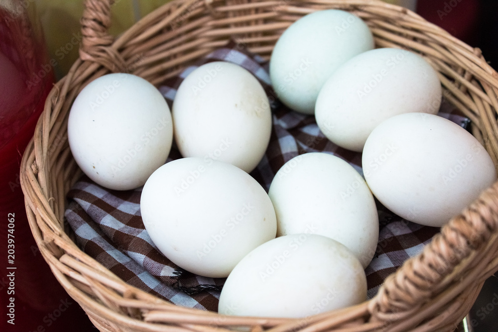 Easter eggs.White duck eggs in basket.Closed up Easter eggs.White duck eggs in basket.Closed up