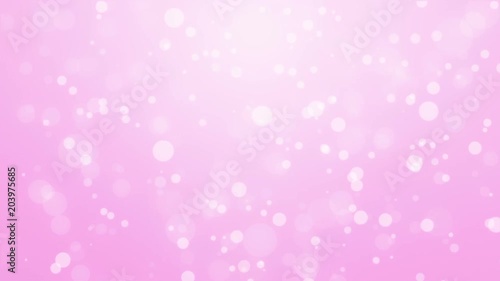 Beautiful light pink holiday background with flickering bokeh particles.